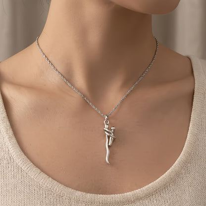 Niche Hugging Figure Pendant Necklace
